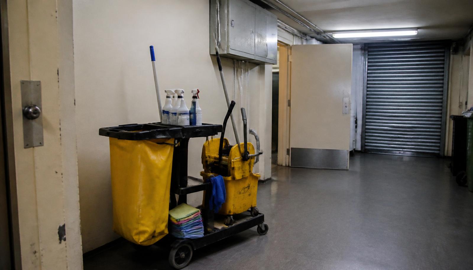 Cleaning trolley and service corridor in an Australian commercial building — ISO 45001 certification for facilities and property services