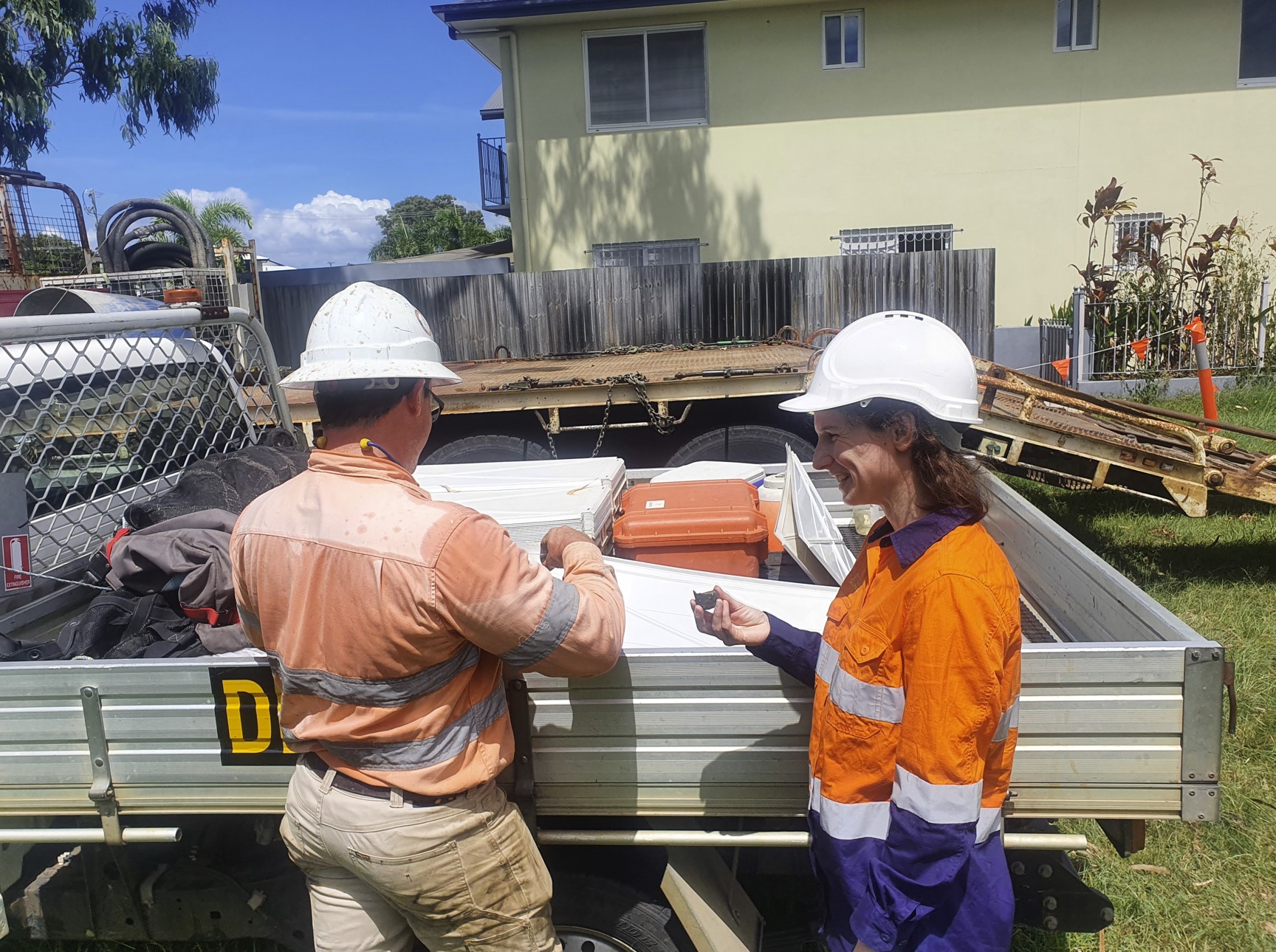ISO certification consultants collaborating on Australian worksite